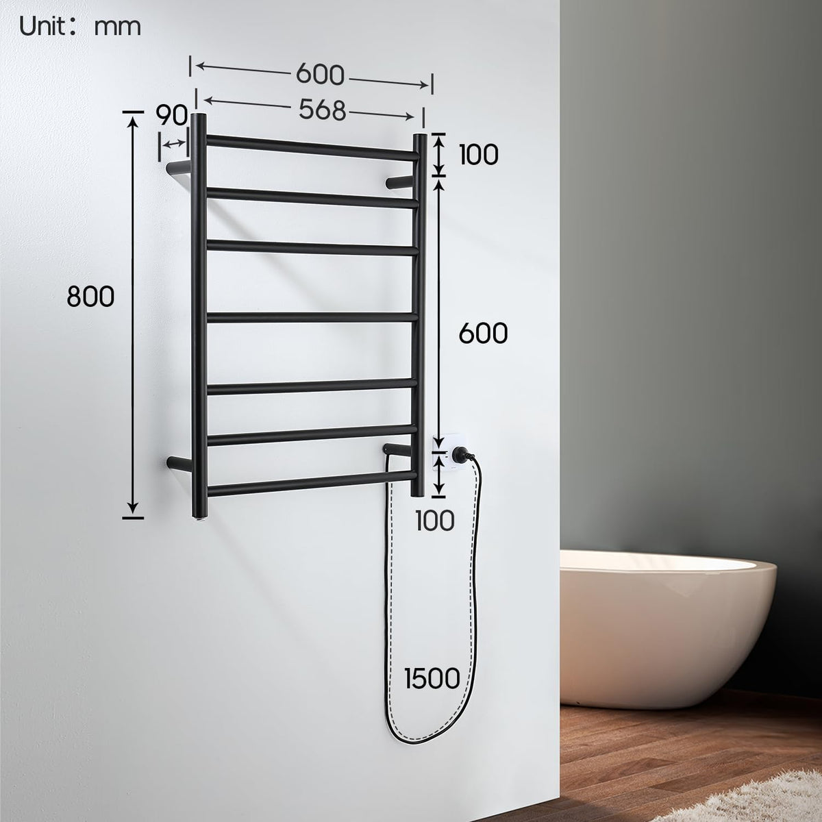 Decaura 7-Bar Heated Towel Rail MB Black metal ladder towel rail with dimension annotations showing measurements in millimeters, set against a split white and gray bathroom wall background.